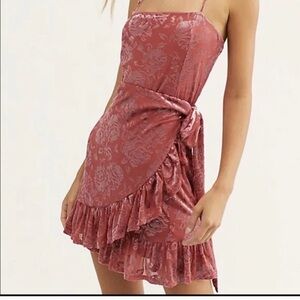 Small pink floral wrap mini dress with ruffle detail